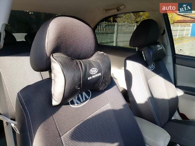 Чорний Кіа Черато, об'ємом двигуна 1.6 л та пробігом 335 тис. км за 5500 $, фото 17 на Automoto.ua