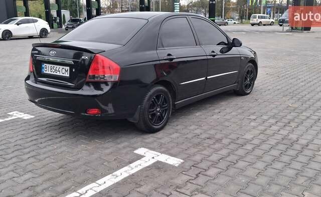 Кіа Черато 2008 у Кременчуге на Automoto.ua Чорний Кіа Черато, об'ємом двигуна 2 л та пробігом 193 тис. км за 5300 $, фото 3 на Automoto.ua