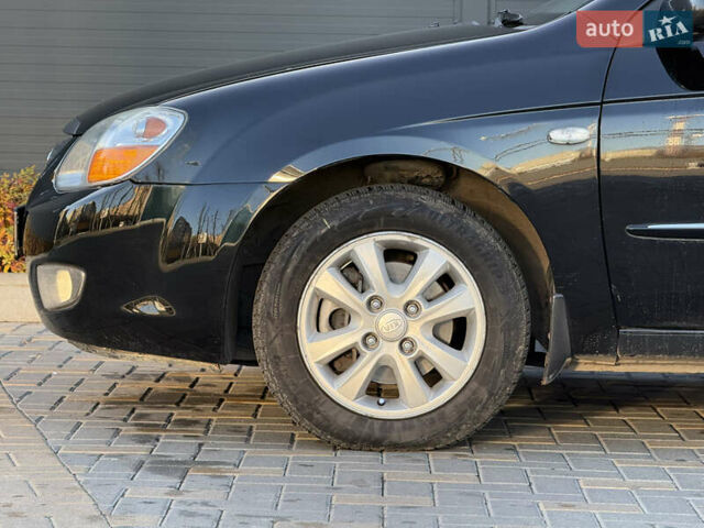 Черный Киа Черато, объемом двигателя 1.98 л и пробегом 180 тыс. км за 5750 $, фото 6 на Automoto.ua