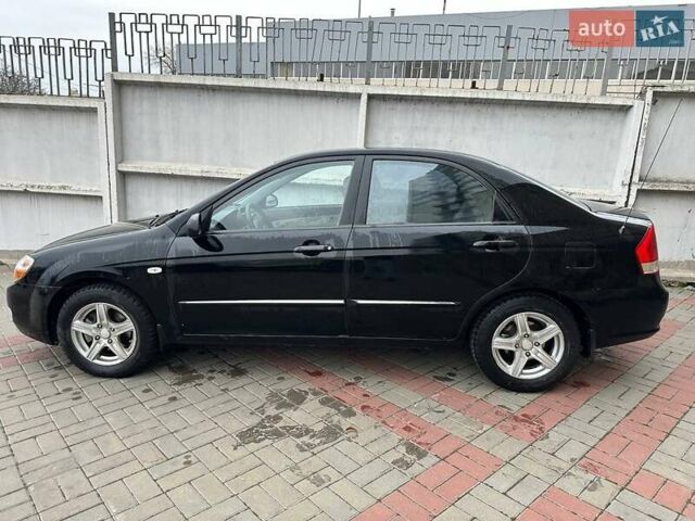 Чорний Кіа Черато, об'ємом двигуна 1.59 л та пробігом 192 тис. км за 4500 $, фото 6 на Automoto.ua