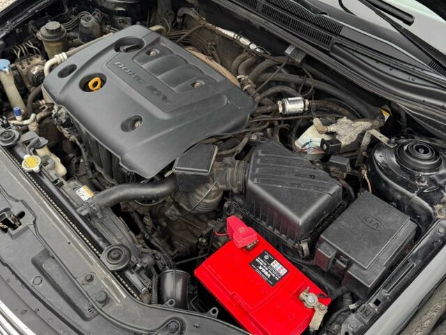 Черный Киа Черато, объемом двигателя 1.6 л и пробегом 258 тыс. км за 5200 $, фото 11 на Automoto.ua