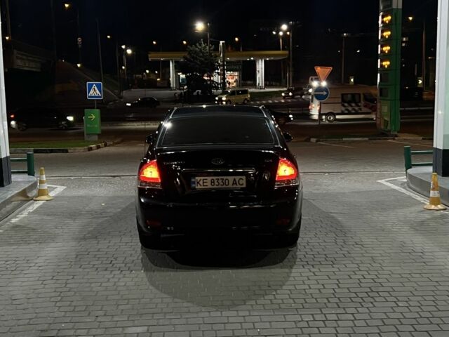 Чорний Кіа Черато, об'ємом двигуна 1.6 л та пробігом 300 тис. км за 4700 $, фото 12 на Automoto.ua