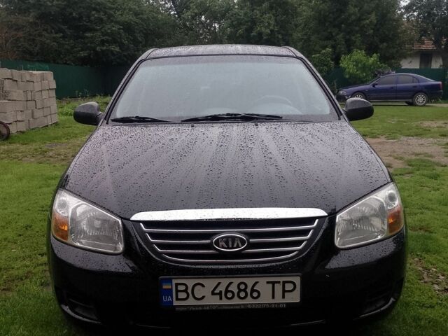 Черный Киа Черато, объемом двигателя 1.6 л и пробегом 208 тыс. км за 4700 $, фото 2 на Automoto.ua