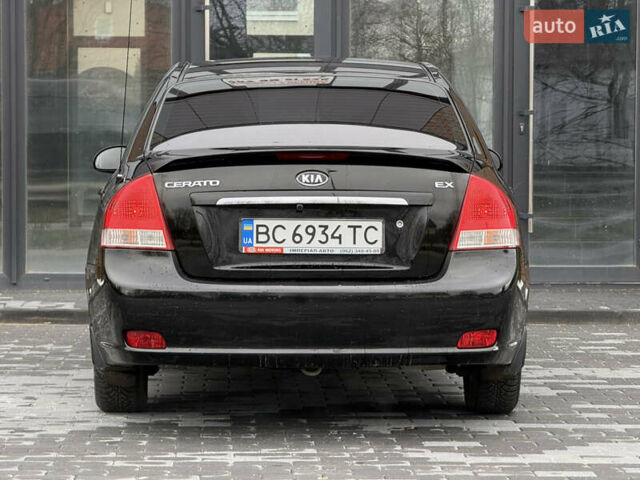 Черный Киа Черато, объемом двигателя 1.98 л и пробегом 180 тыс. км за 5500 $, фото 11 на Automoto.ua
