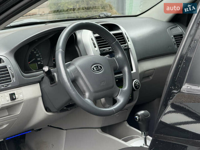 Черный Киа Черато, объемом двигателя 1.98 л и пробегом 180 тыс. км за 5500 $, фото 29 на Automoto.ua