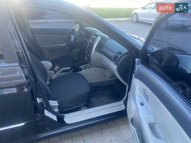 Черный Киа Черато, объемом двигателя 1.59 л и пробегом 166 тыс. км за 4600 $, фото 12 на Automoto.ua