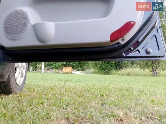 Черный Киа Черато, объемом двигателя 1.59 л и пробегом 237 тыс. км за 3900 $, фото 18 на Automoto.ua