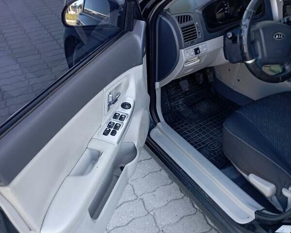 Черный Киа Черато, объемом двигателя 1.59 л и пробегом 166 тыс. км за 4600 $, фото 17 на Automoto.ua