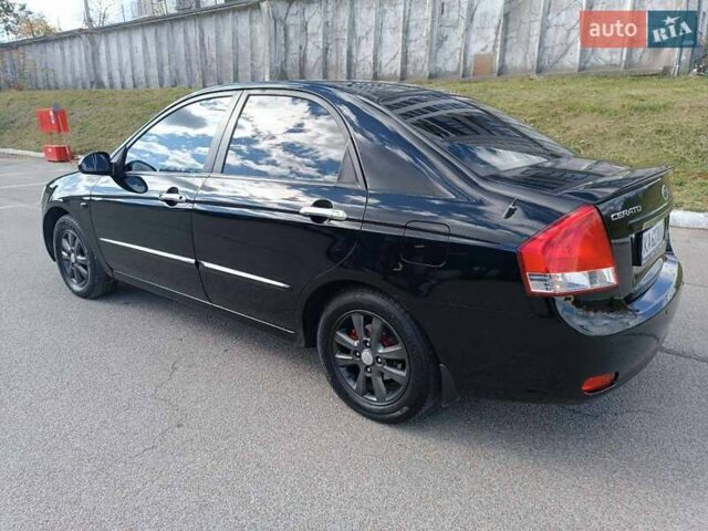 Черный Киа Черато, объемом двигателя 2 л и пробегом 298 тыс. км за 4250 $, фото 6 на Automoto.ua