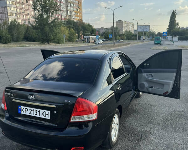 Чорний Кіа Черато, об'ємом двигуна 1.6 л та пробігом 156 тис. км за 4900 $, фото 1 на Automoto.ua