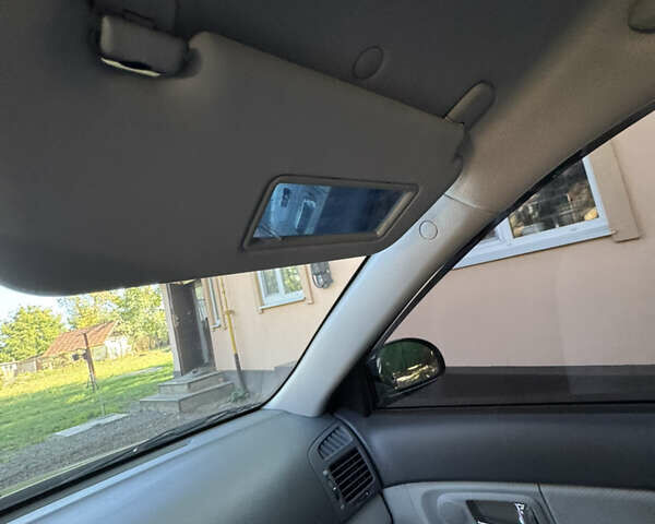 Чорний Кіа Черато, об'ємом двигуна 1.6 л та пробігом 16 тис. км за 8000 $, фото 7 на Automoto.ua