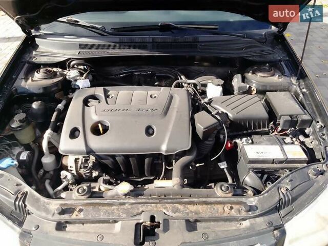 Чорний Кіа Черато, об'ємом двигуна 1.6 л та пробігом 335 тис. км за 5500 $, фото 8 на Automoto.ua