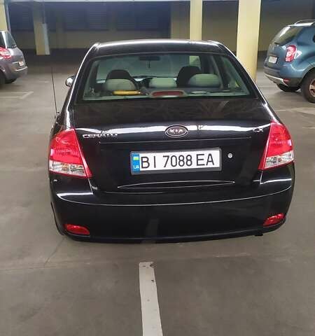 Черный Киа Черато, объемом двигателя 1.6 л и пробегом 188 тыс. км за 5200 $, фото 5 на Automoto.ua