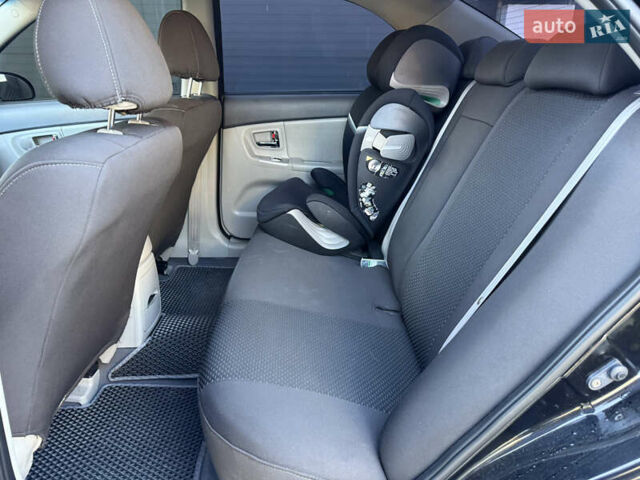 Черный Киа Черато, объемом двигателя 1.98 л и пробегом 180 тыс. км за 5750 $, фото 31 на Automoto.ua