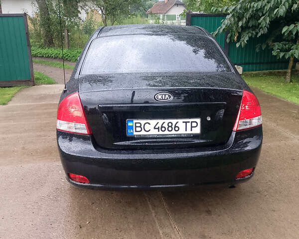 Чорний Кіа Черато, об'ємом двигуна 1.6 л та пробігом 210 тис. км за 4700 $, фото 6 на Automoto.ua