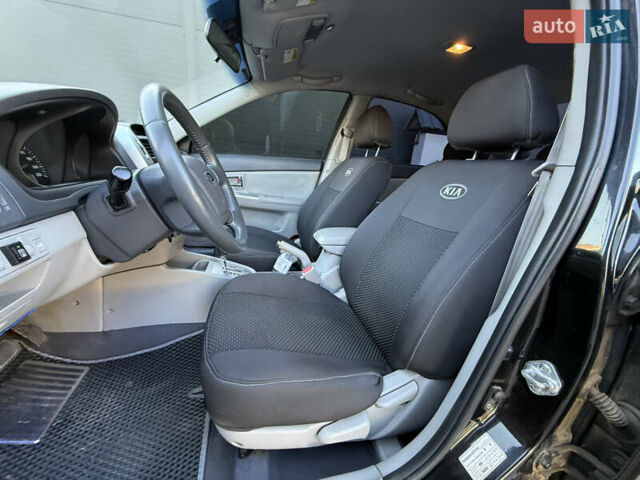 Черный Киа Черато, объемом двигателя 1.98 л и пробегом 180 тыс. км за 5750 $, фото 38 на Automoto.ua