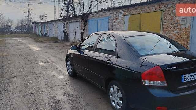 Чорний Кіа Черато, об'ємом двигуна 1.6 л та пробігом 185 тис. км за 4400 $, фото 19 на Automoto.ua