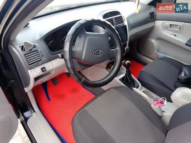 Чорний Кіа Черато, об'ємом двигуна 1.6 л та пробігом 335 тис. км за 5500 $, фото 11 на Automoto.ua