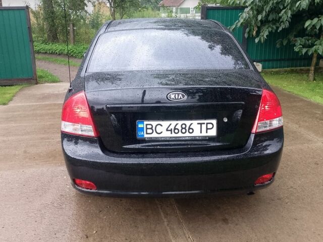 Черный Киа Черато, объемом двигателя 1.6 л и пробегом 208 тыс. км за 4700 $, фото 6 на Automoto.ua