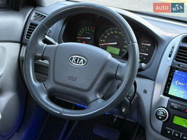 Черный Киа Черато, объемом двигателя 1.98 л и пробегом 180 тыс. км за 5750 $, фото 28 на Automoto.ua