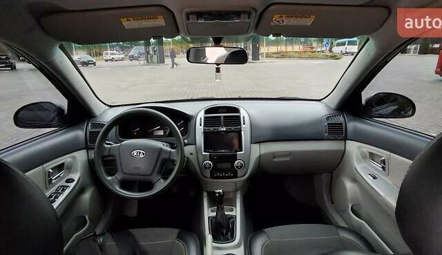 Кіа Черато 2008 у Кременчуге на Automoto.ua Чорний Кіа Черато, об'ємом двигуна 2 л та пробігом 193 тис. км за 5300 $, фото 8 на Automoto.ua