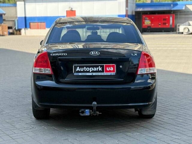 Черный Киа Черато, объемом двигателя 1.6 л и пробегом 239 тыс. км за 5140 $, фото 3 на Automoto.ua