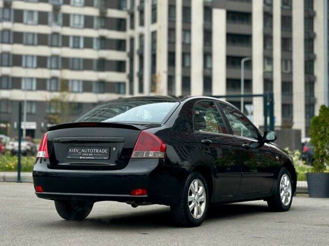 Чорний Кіа Черато, об'ємом двигуна 2 л та пробігом 270 тис. км за 4000 $, фото 2 на Automoto.ua