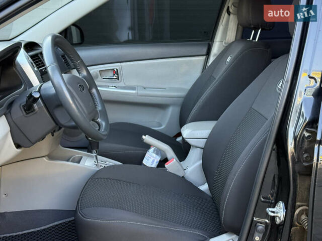 Черный Киа Черато, объемом двигателя 1.98 л и пробегом 180 тыс. км за 5750 $, фото 37 на Automoto.ua