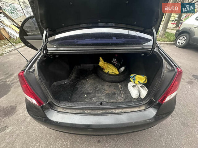Черный Киа Черато, объемом двигателя 2 л и пробегом 220 тыс. км за 3400 $, фото 8 на Automoto.ua