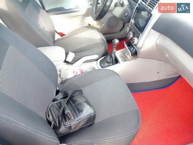 Чорний Кіа Черато, об'ємом двигуна 1.6 л та пробігом 335 тис. км за 5500 $, фото 16 на Automoto.ua