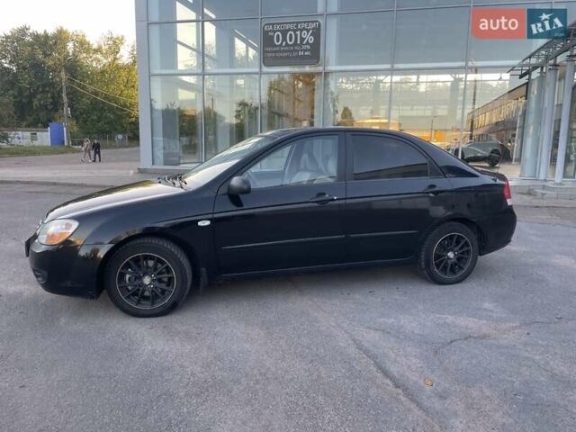 Чорний Кіа Черато, об'ємом двигуна 1.6 л та пробігом 299 тис. км за 4500 $, фото 1 на Automoto.ua