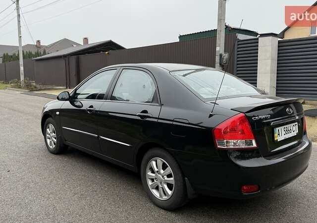 Черный Киа Черато, объемом двигателя 2 л и пробегом 186 тыс. км за 4999 $, фото 1 на Automoto.ua