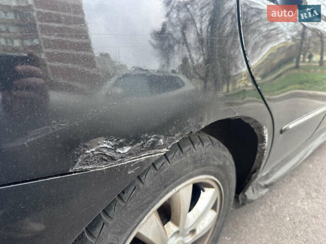 Черный Киа Черато, объемом двигателя 2 л и пробегом 220 тыс. км за 3400 $, фото 12 на Automoto.ua