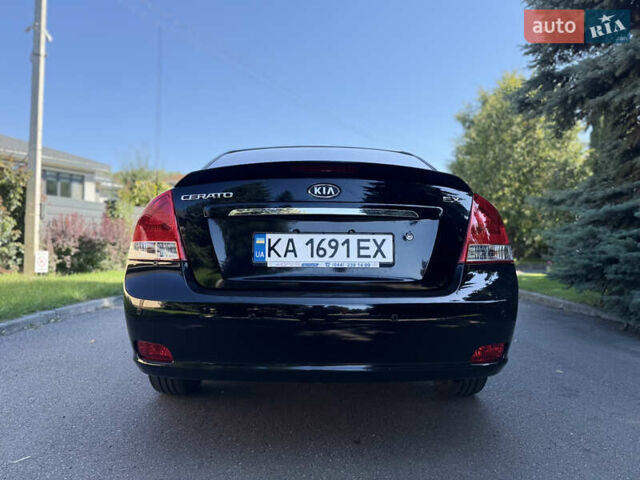 Черный Киа Черато, объемом двигателя 2 л и пробегом 110 тыс. км за 5999 $, фото 4 на Automoto.ua