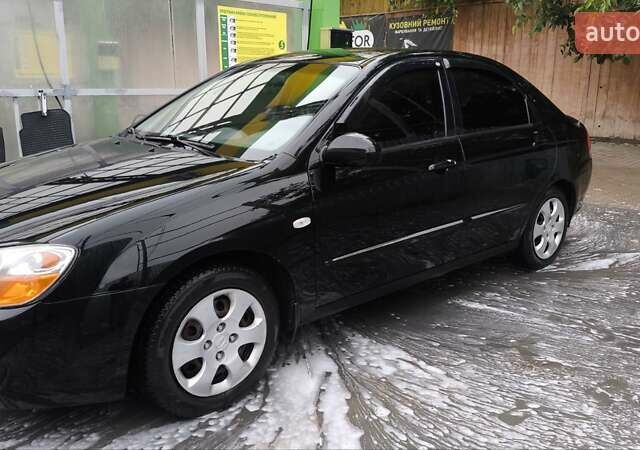 Черный Киа Черато, объемом двигателя 1.6 л и пробегом 192 тыс. км за 4250 $, фото 1 на Automoto.ua