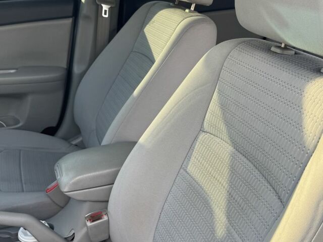 Черный Киа Черато, объемом двигателя 1.6 л и пробегом 156 тыс. км за 5500 $, фото 18 на Automoto.ua