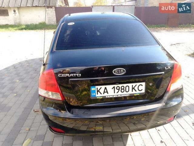 Чорний Кіа Черато, об'ємом двигуна 1.6 л та пробігом 335 тис. км за 5500 $, фото 6 на Automoto.ua