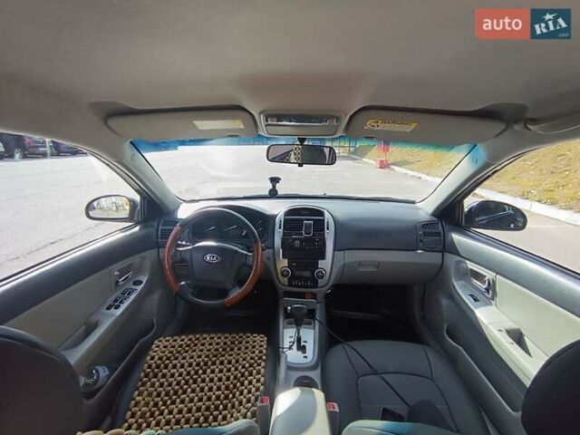 Черный Киа Черато, объемом двигателя 2 л и пробегом 298 тыс. км за 4250 $, фото 3 на Automoto.ua