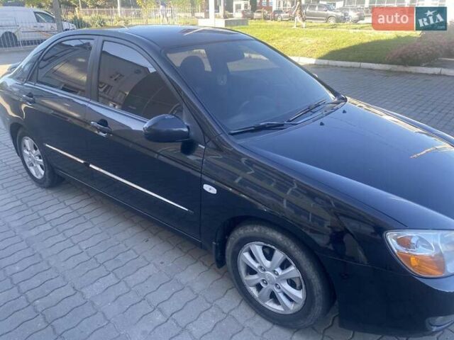 Черный Киа Черато, объемом двигателя 1.59 л и пробегом 166 тыс. км за 4800 $, фото 8 на Automoto.ua