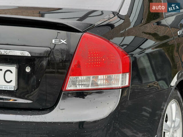 Черный Киа Черато, объемом двигателя 1.98 л и пробегом 180 тыс. км за 5500 $, фото 14 на Automoto.ua