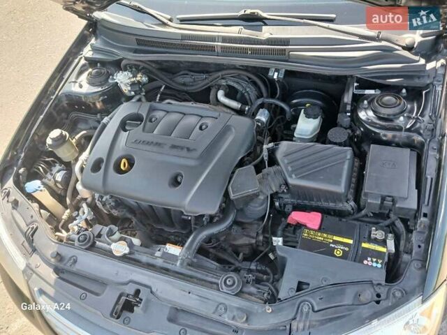 Черный Киа Черато, объемом двигателя 1.6 л и пробегом 225 тыс. км за 5200 $, фото 7 на Automoto.ua