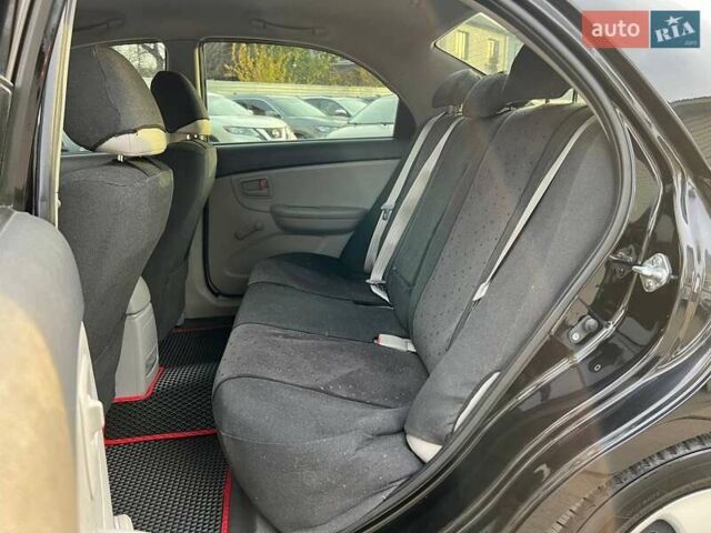 Чорний Кіа Черато, об'ємом двигуна 1.59 л та пробігом 75 тис. км за 6690 $, фото 9 на Automoto.ua
