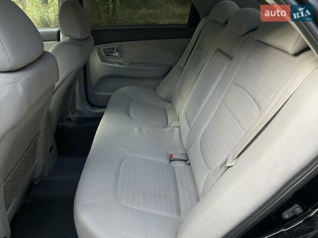 Черный Киа Черато, объемом двигателя 2 л и пробегом 173 тыс. км за 4800 $, фото 21 на Automoto.ua