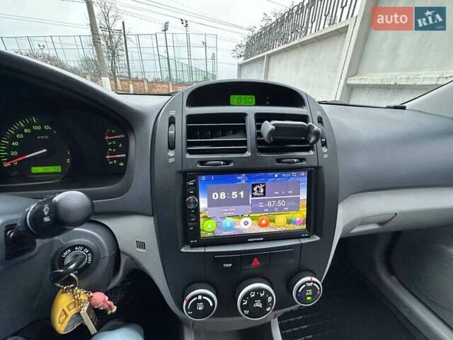 Чорний Кіа Черато, об'ємом двигуна 1.59 л та пробігом 192 тис. км за 4500 $, фото 2 на Automoto.ua