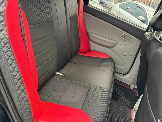 Черный Киа Черато, объемом двигателя 1.6 л и пробегом 258 тыс. км за 5200 $, фото 13 на Automoto.ua