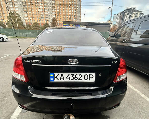 Черный Киа Черато, объемом двигателя 1.58 л и пробегом 350 тыс. км за 4500 $, фото 11 на Automoto.ua