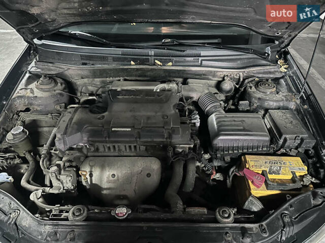 Черный Киа Черато, объемом двигателя 2 л и пробегом 220 тыс. км за 3400 $, фото 14 на Automoto.ua