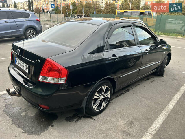 Черный Киа Черато, объемом двигателя 1.58 л и пробегом 350 тыс. км за 4500 $, фото 12 на Automoto.ua