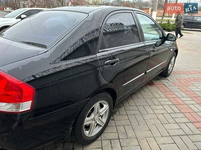 Чорний Кіа Черато, об'ємом двигуна 1.59 л та пробігом 192 тис. км за 4500 $, фото 7 на Automoto.ua