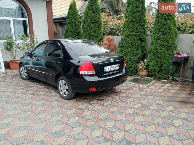 Черный Киа Черато, объемом двигателя 1.6 л и пробегом 260 тыс. км за 3800 $, фото 5 на Automoto.ua